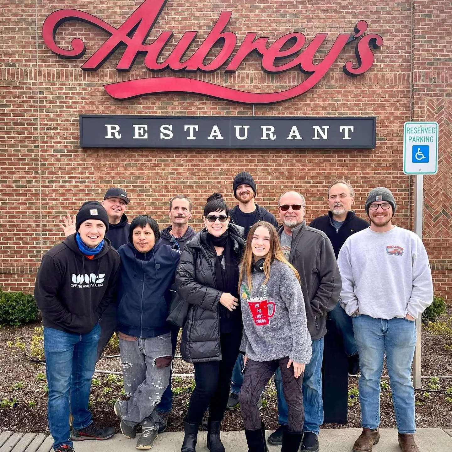 The Pro Auto Custom Interiors crew outside Aubrey's restaurant at their 2022 Christmas dinner